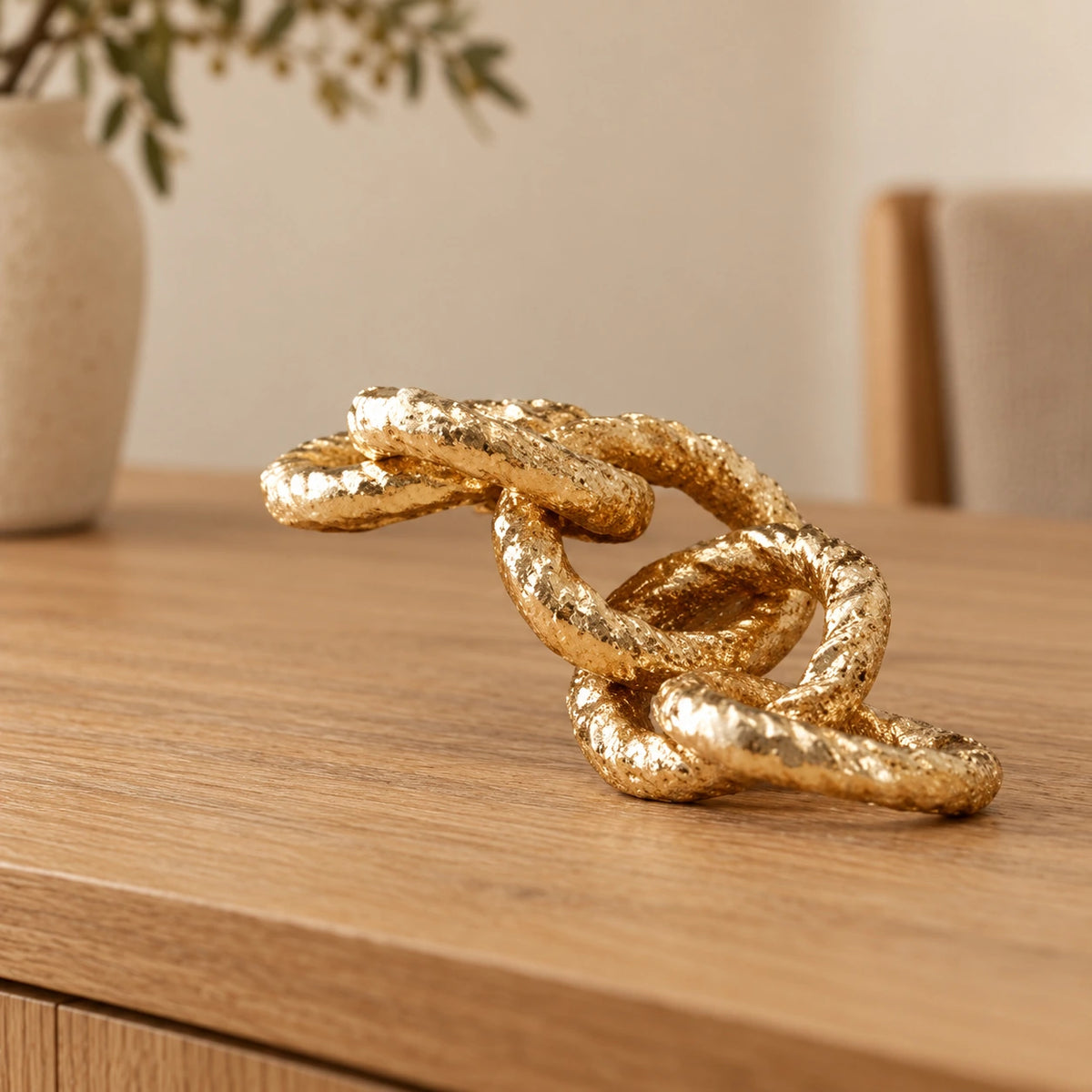 Cadena en dorado – adorno decorativo para sala